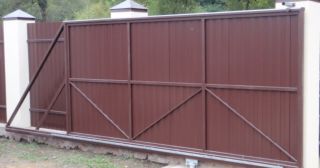 Купить откатные ворота из профнастила Новоалтайск, цена от 1757 руб.